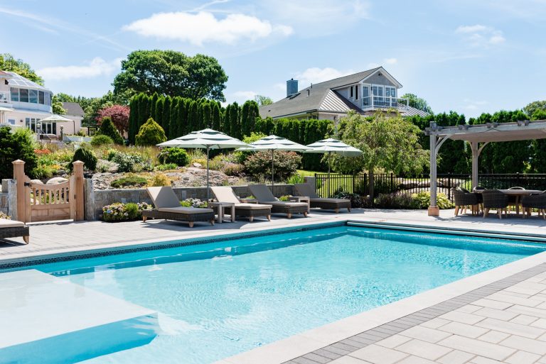 Example of a beach style rectangular pool design in Boston