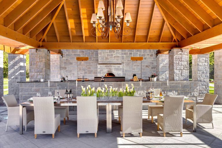Example of a classic concrete patio kitchen design in Philadelphia with a gazebo