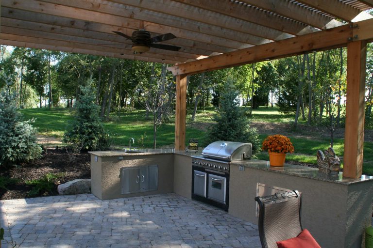 Example of a classic patio design in Kansas City by Deckscapes / DS Construction, Inc. | Outdoor Photos | Porch | Landscaping | Landscape Design | Outdoor Living Space | Porch Design Ideas | Outdoor Living Space Ideas | Backyard Design