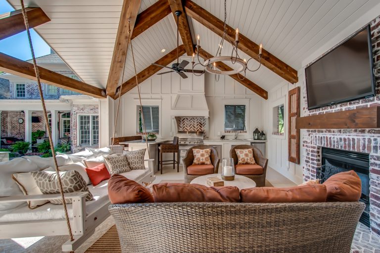 Example of a cottage patio kitchen design in Nashville with a roof extension