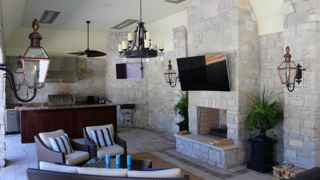 Example of a huge classic backyard concrete paver pool house design in Indianapolis