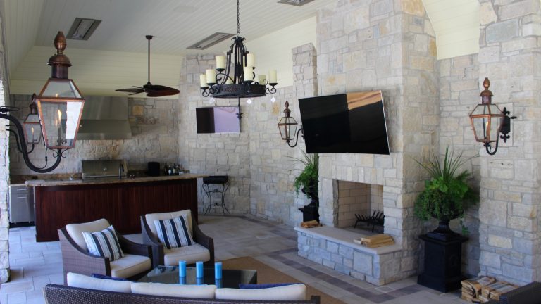 Example of a huge classic backyard concrete paver pool house design in Indianapolis