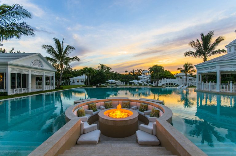 Example of a huge island style custom-shaped pool design in Miami