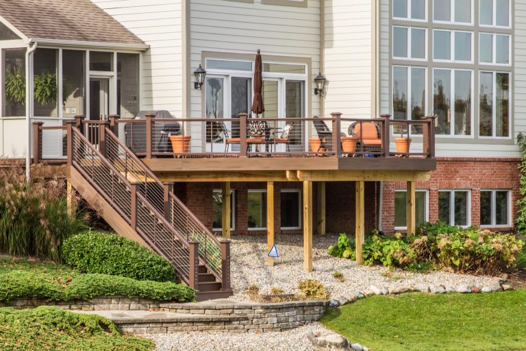 Example of a large classic backyard outdoor kitchen deck design in Indianapolis with no cover