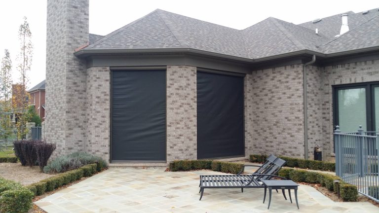 Example of a large classic backyard tile patio kitchen design in Orange County with a roof extension