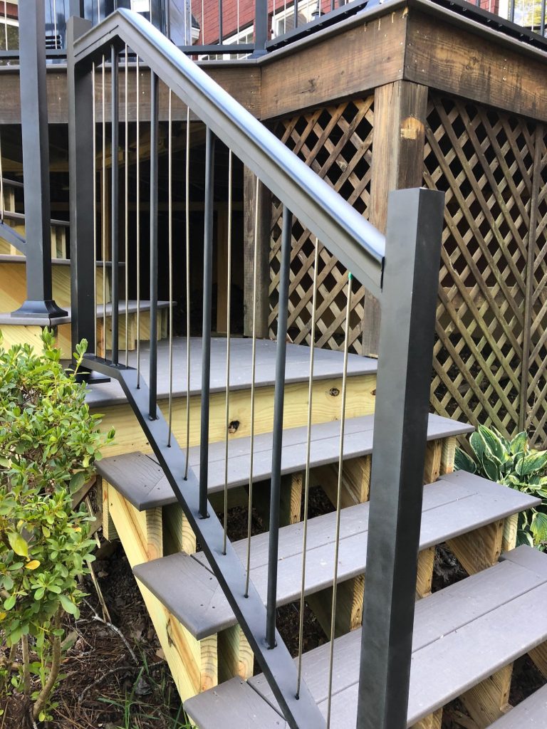 Example of a large eclectic backyard second story metal railing outdoor kitchen deck design in Nashville with no cover