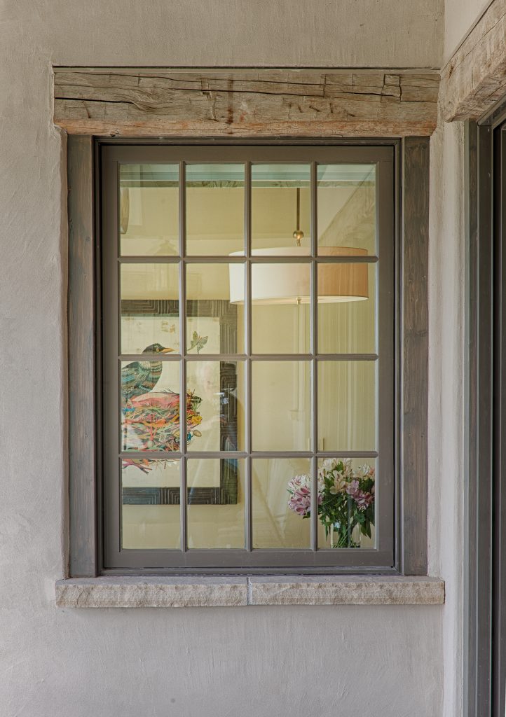 Example of a large farmhouse backyard patio kitchen design in Denver with a roof extension