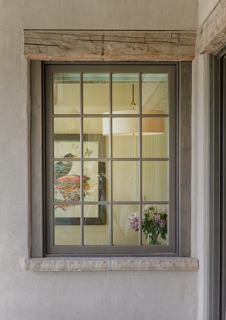 Example of a large farmhouse backyard patio kitchen design in Denver with a roof extension