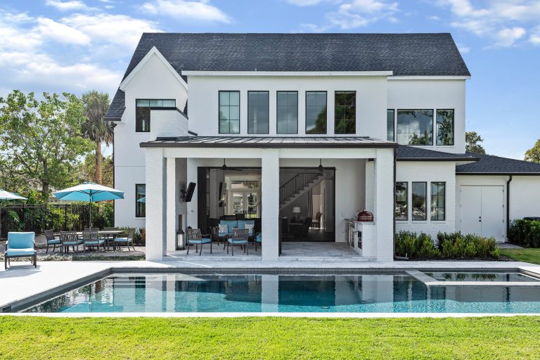 Example of a large transitional backyard rectangular hot tub design in Orlando