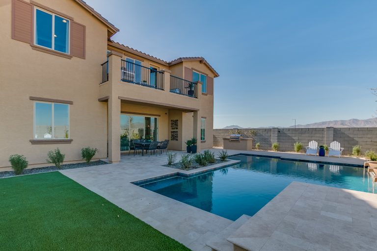 Example of a large trendy backyard concrete patio kitchen design in Phoenix with no cover