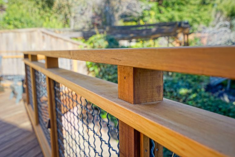 Example of a large trendy backyard outdoor kitchen deck design in San Francisco with no cover