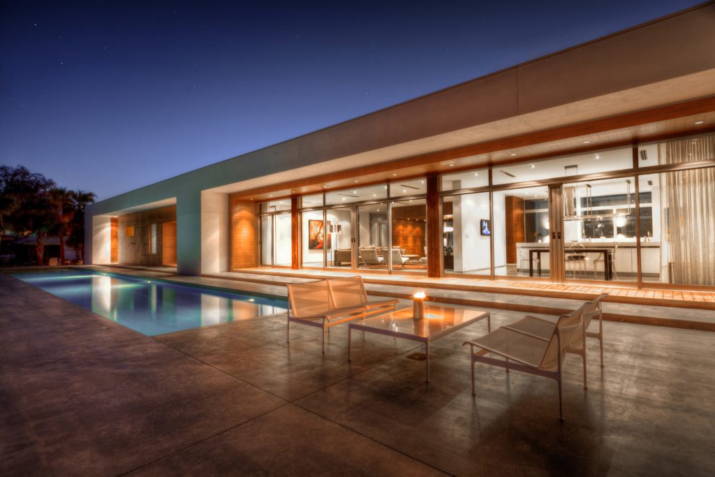 Example of a large trendy backyard rectangular lap pool design in Los Angeles