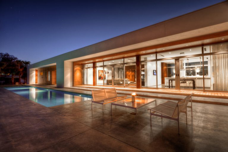 Example of a large trendy backyard rectangular lap pool design in Los Angeles