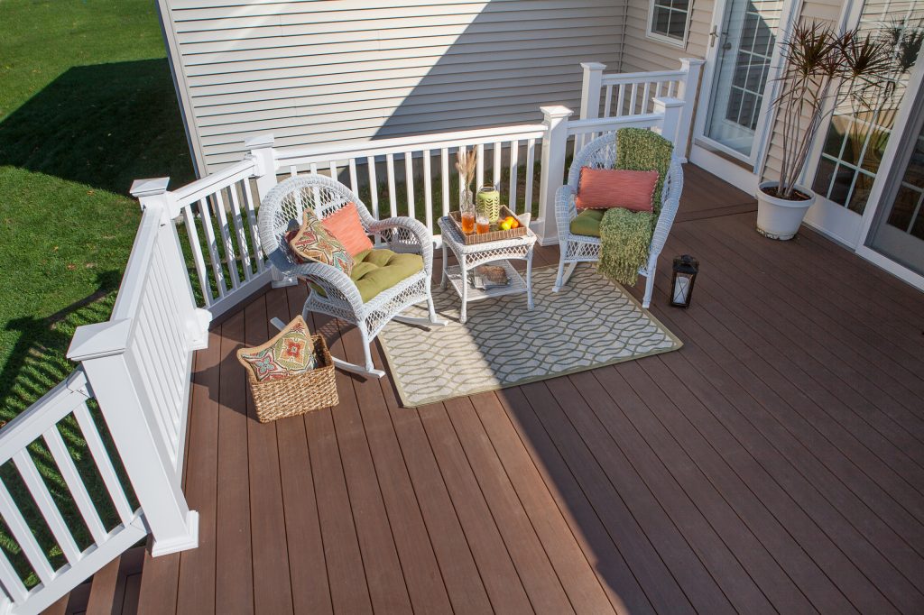 Example of a mid-sized arts and crafts backyard outdoor kitchen deck design in Boston with no cover