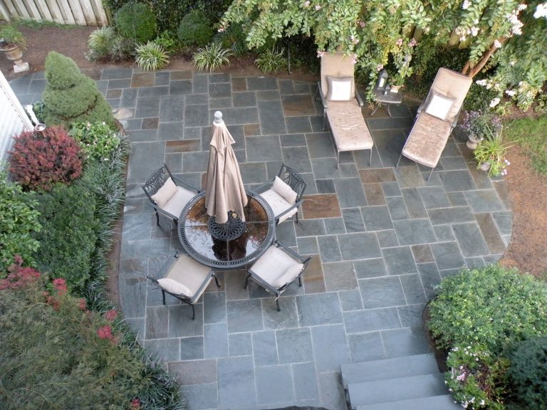 Example of a mid-sized classic backyard tile patio kitchen design in DC Metro with no cover