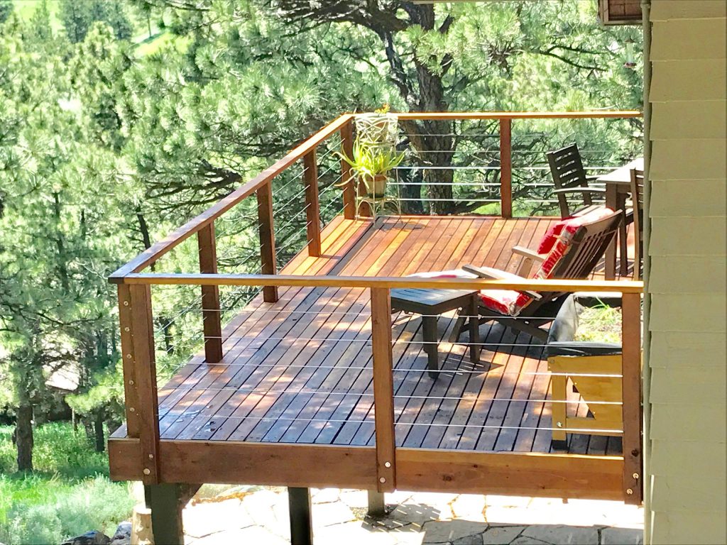 Example of a mid-sized farmhouse outdoor kitchen deck design in Denver