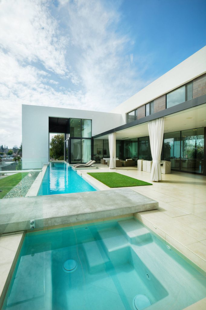 Example of a mid-sized minimalist backyard tile and rectangular lap hot tub design in San Francisco