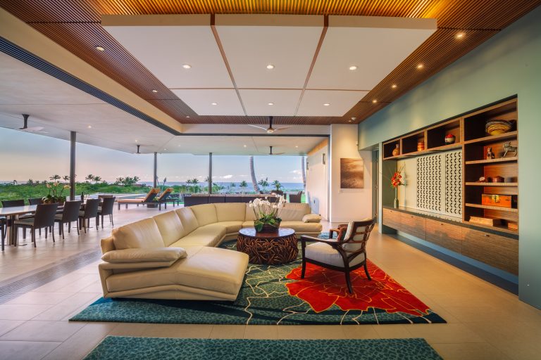 Example of a mid-sized trendy backyard concrete patio kitchen design in Hawaii with a roof extension