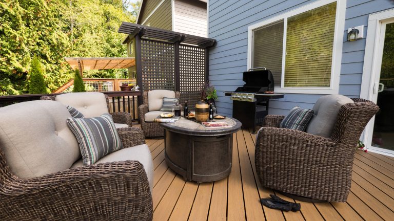 Example of a mid-sized trendy backyard outdoor kitchen deck design in Seattle with a pergola
