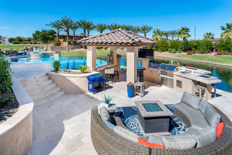 Example of a mid-sized trendy backyard tile patio kitchen design in Phoenix with a gazebo