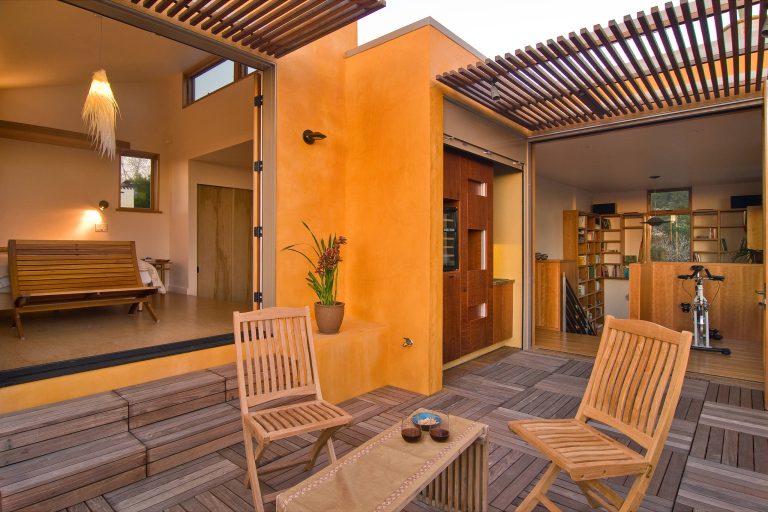 Example of a mid-sized trendy rooftop outdoor kitchen deck design in San Francisco with a pergola