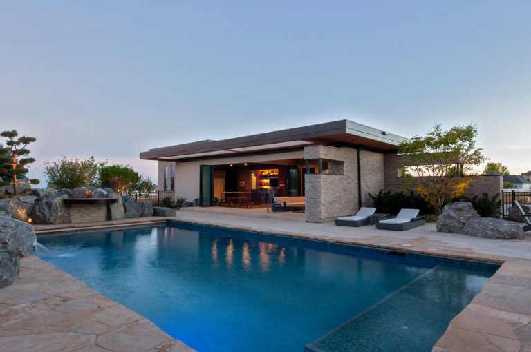 Example of a minimalist pool house design in Denver