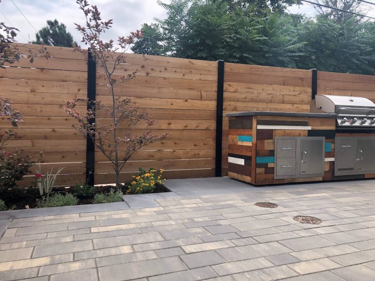 Example of a small minimalist backyard patio kitchen design in Denver
