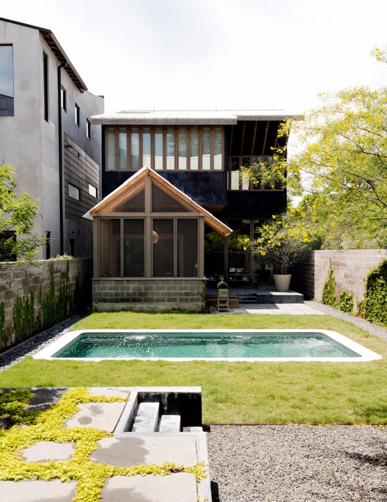 Example of a small trendy backyard concrete and rectangular lap pool design in Houston