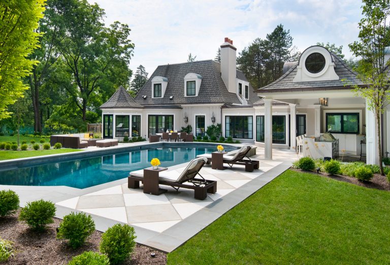 Example of a transitional backyard custom-shaped pool design in Philadelphia