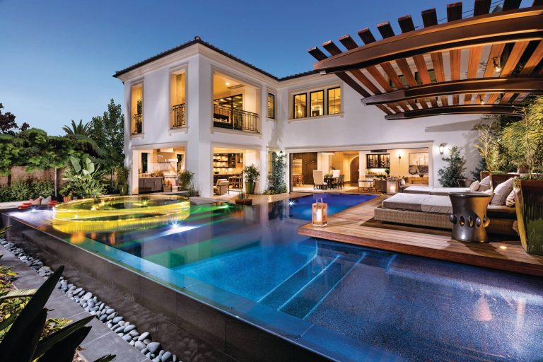 Example of a transitional backyard l-shaped hot tub design in Philadelphia with decking