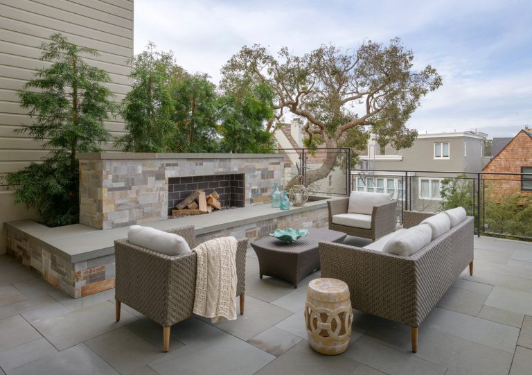 Example of a transitional second story mixed material railing deck design in San Francisco