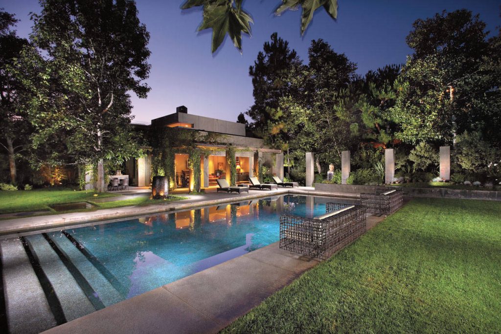 Example of a trendy backyard rectangular pool design in Orange County