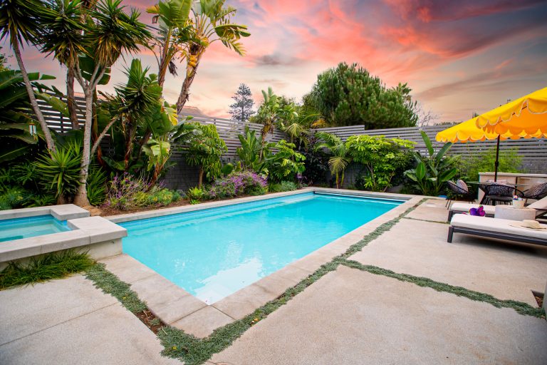 Example of a trendy concrete and rectangular hot tub design in Los Angeles