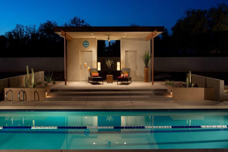 Example of a trendy rectangular pool house design in Phoenix