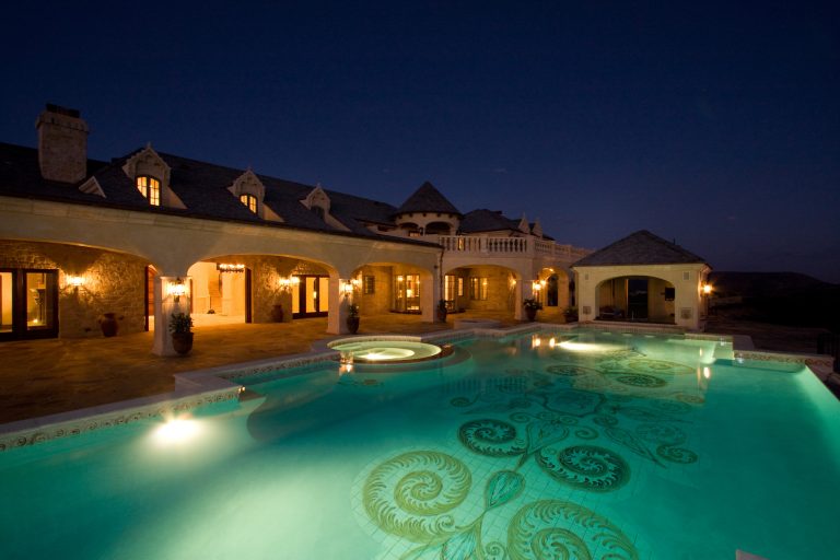 Example of a tuscan custom-shaped pool design in San Diego