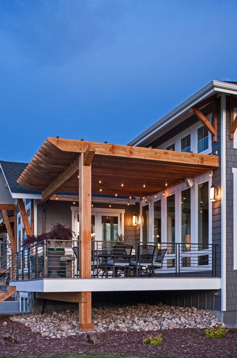 Example of an arts and crafts deck design in Denver