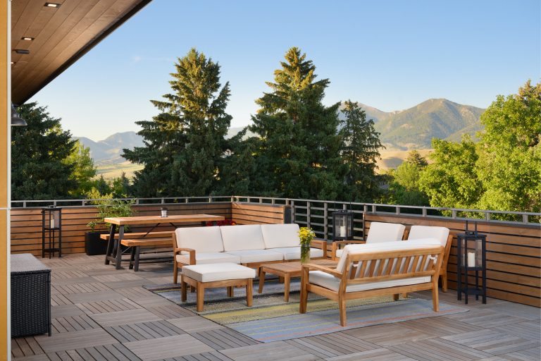 Example of an urban rooftop rooftop mixed material railing outdoor kitchen deck design in Other with no cover