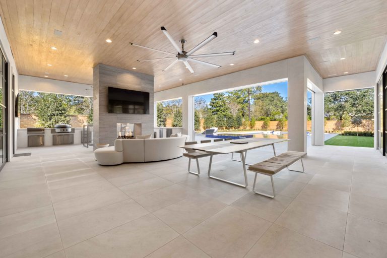 Expansive Outdoor Living space with gourmet appliances and outdoor fireplace