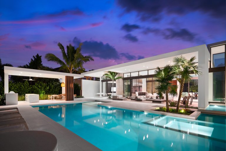Extensive use of glass and sliding glass doors were incorporated to allow for an abundance of natural light, emphasizing an indoor-outdoor lifestyle.