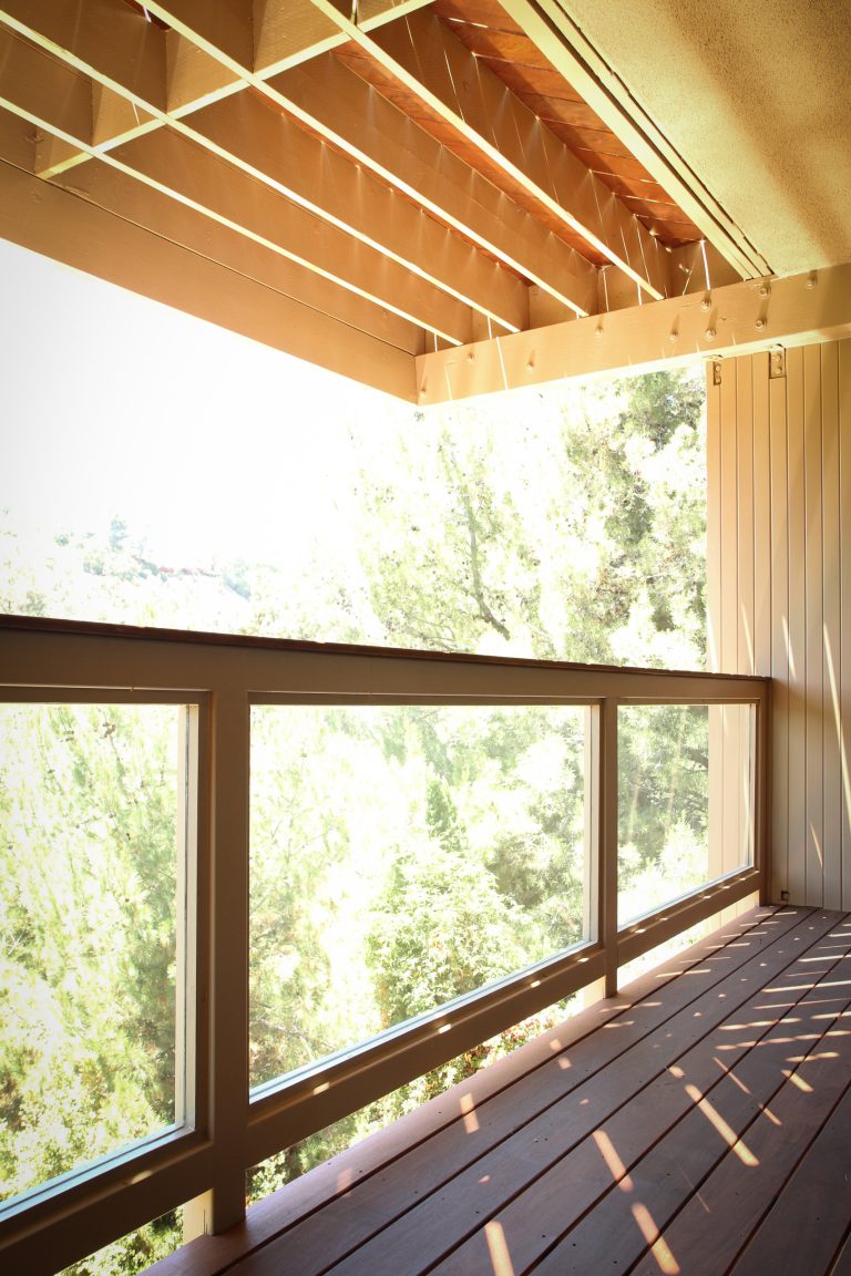 Exterior work include built new balconies, TexCote paint and new red wood siding.