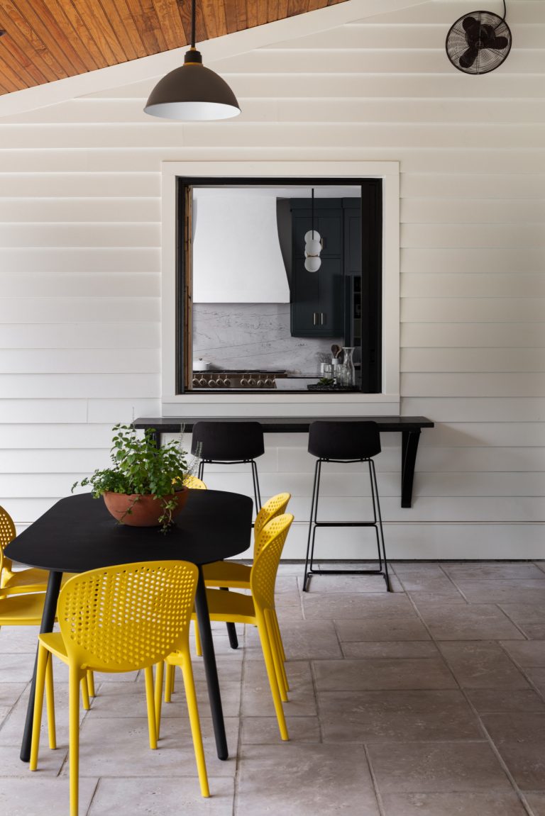 Farmhouse backyard patio kitchen photo in Other
