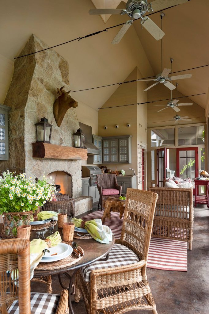 Farmhouse outdoor kitchen porch photo in Houston with a roof extension by | Outdoor Photos | Porch | Landscaping | Landscape Design | Outdoor Living Space | Porch Design Ideas | Outdoor Living Space Ideas | Backyard Design