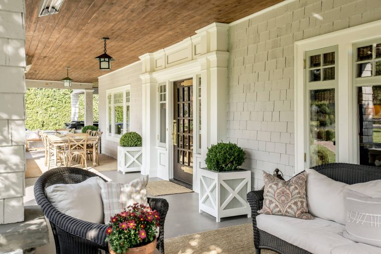 Farmhouse porch container garden idea in Los Angeles with a roof extension by JAMES V. COANE & ASSOCIATES, ARCHITECTS | Outdoor Photos | Porch | Landscaping | Landscape Design | Outdoor Living Space | Porch Design Ideas | Outdoor Living Space Ideas | Backyard Design