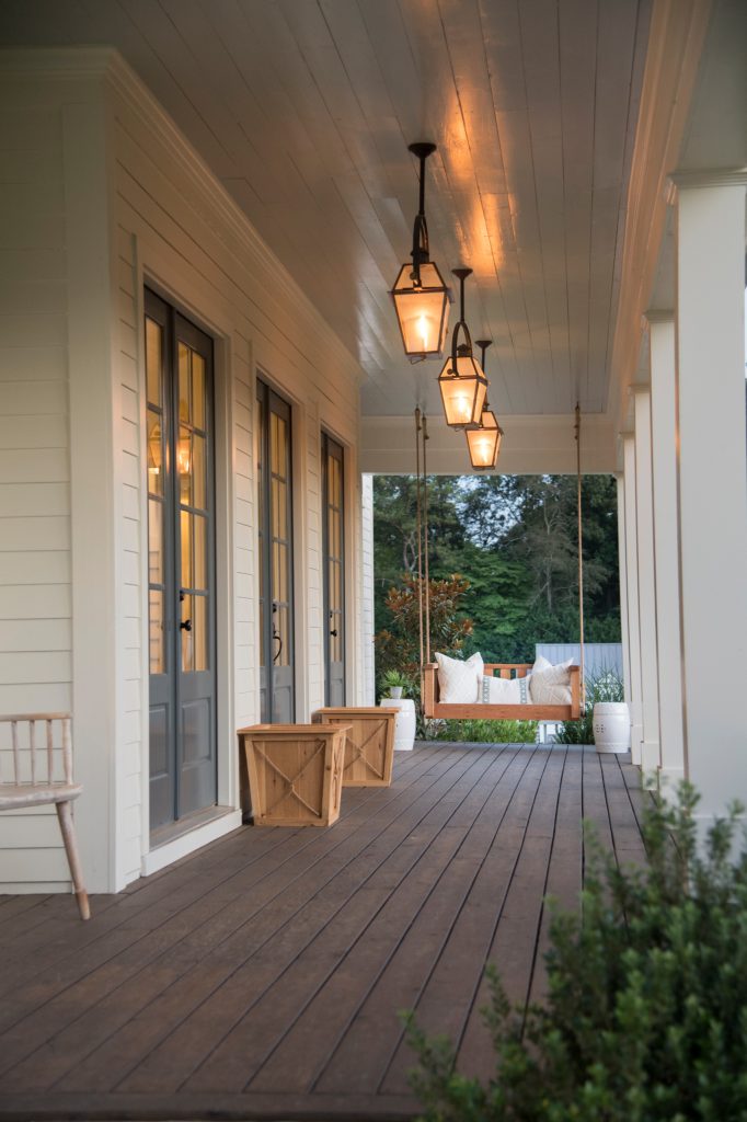 Farmhouse porch photo in Atlanta by Cole Construction | Outdoor Photos | Porch | Landscaping | Landscape Design | Outdoor Living Space | Porch Design Ideas | Outdoor Living Space Ideas | Backyard Design