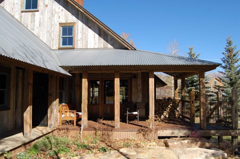 Farmhouse porch photo in Denver with decking and a roof extension by Coburn Design Build | Outdoor Photos | Porch | Landscaping | Landscape Design | Outdoor Living Space | Porch Design Ideas | Outdoor Living Space Ideas | Backyard Design