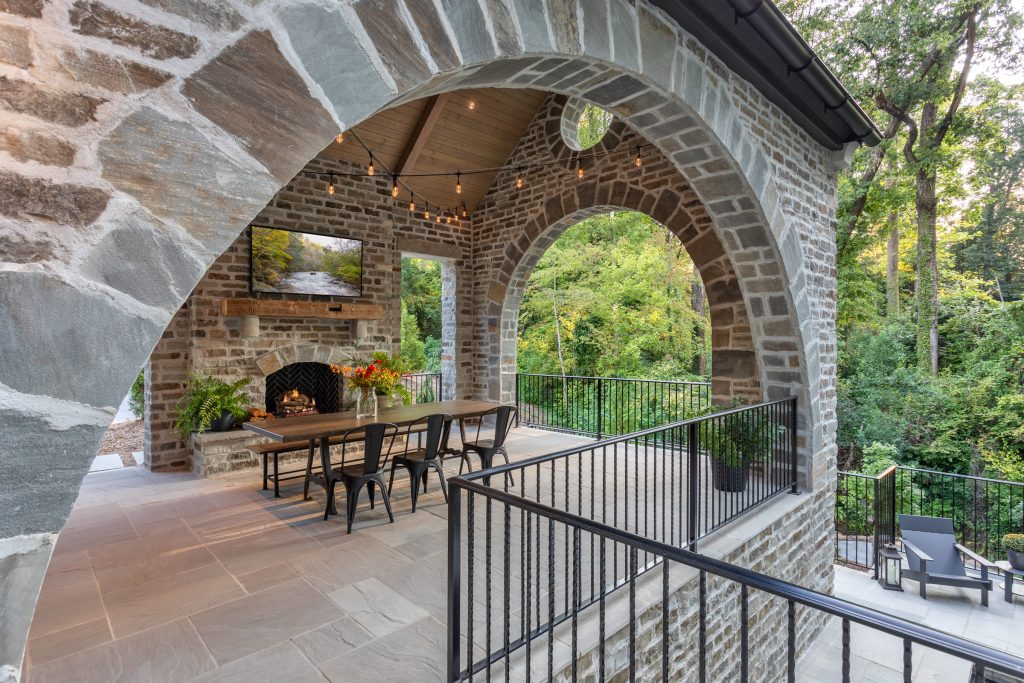 Farmhouse porch photo in Other by Sun Windows and Doors | Outdoor Photos | Porch | Landscaping | Landscape Design | Outdoor Living Space | Porch Design Ideas | Outdoor Living Space Ideas | Backyard Design