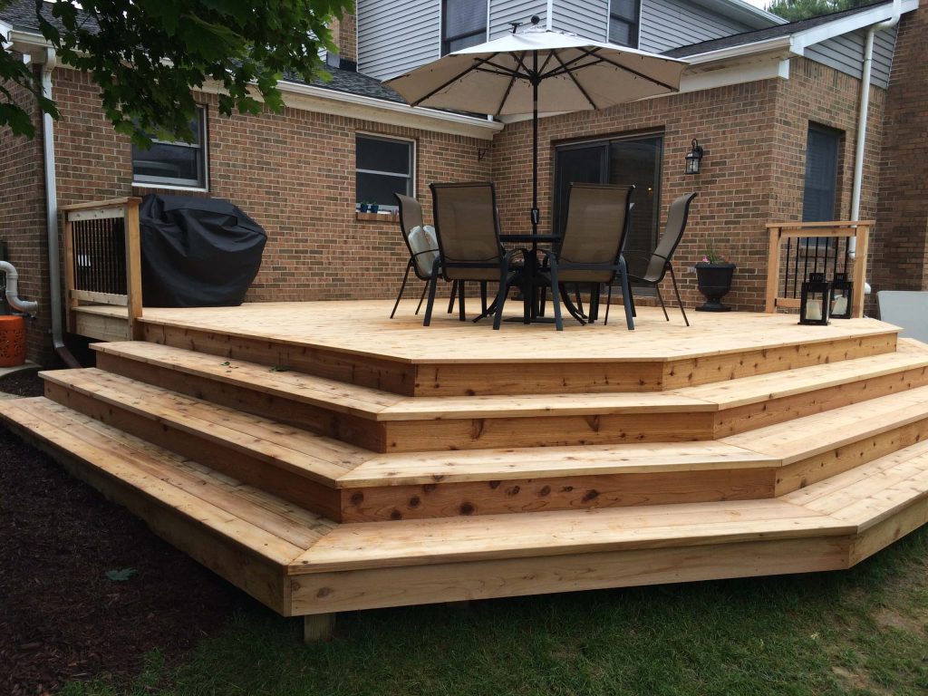 Finished rear deck with cascading stairs