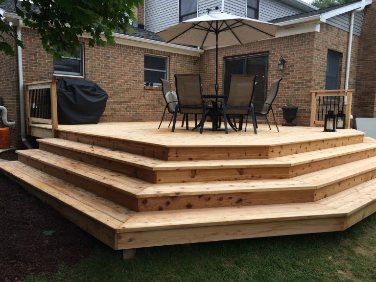 Finished rear deck with cascading stairs