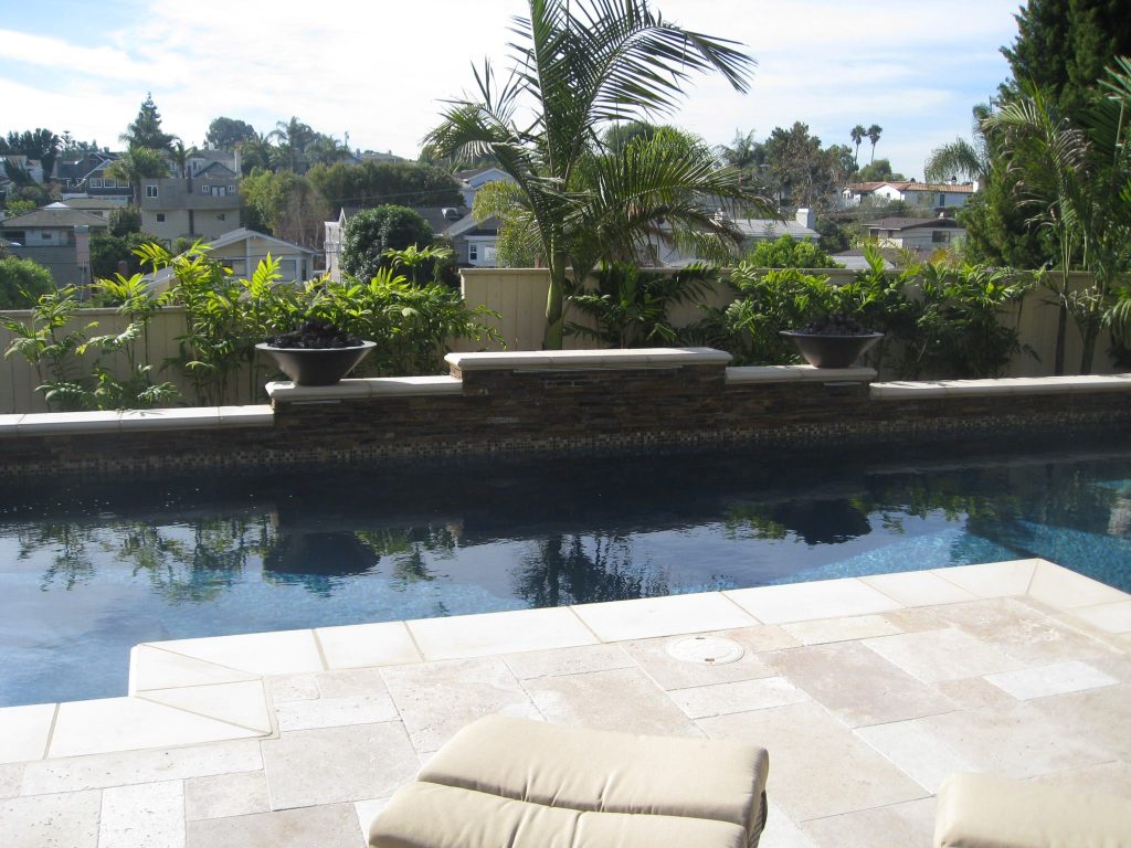 Fire Bowls on raised pool wall