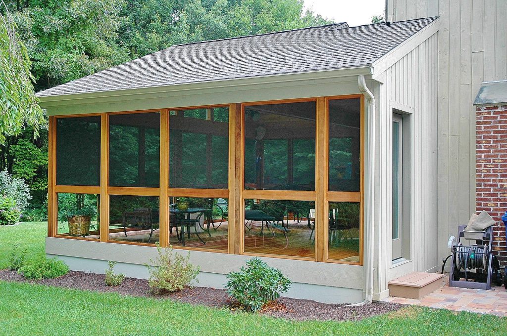 From the opposite side of the three-season porch you can see the intricacies of the custom roofline at work. Photots courtesy Archadeck of Central CT. by Archadeck of Central Connecticut | Outdoor Photos | Porch | Landscaping | Landscape Design | Outdoor Living Space | Porch Design Ideas | Outdoor Living Space Ideas | Backyard Design